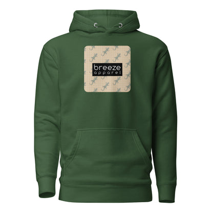 Green hoodie with square over chest that contains pattern of green geckos set on beige background, overlaid with black, rectangular logo with white lettering.