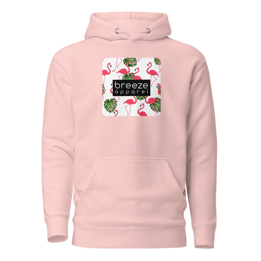 Pink hoodie with graphic of flamingos and green palm leaves set on a white background and overlaid with a black, rectangular logo.