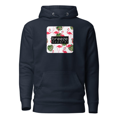 Navy hoodie with graphic of flamingos and green palm leaves set on a white background and overlaid with a black, rectangular logo.