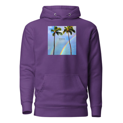 Purple hoodie with graphic of palm trees with rainbows in the background.