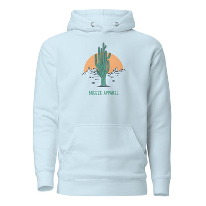 Light-blue hoodie with graphic of cactus and sunset.