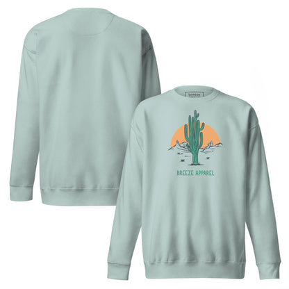 Silver-blue sweatshirt with graphic of cactus and sun. Plain back also shown.
