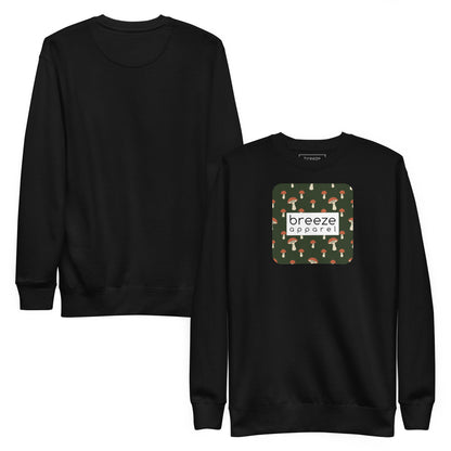Black sweatshirt with square graphic of mushrooms set on a green background and overlaid with a white, rectangular logo. Plain back also shown.