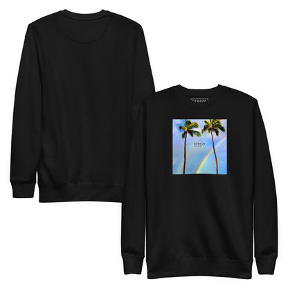Black sweatshirt with graphic of two palm trees with a rainbow in background. Plain back of shirt also shown.