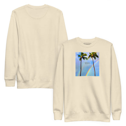 Beige sweatshirt with graphic of two palm trees with a rainbow in background. Plain back of shirt also shown.