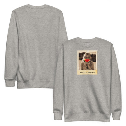 Gray sweatshirt with graphic of woman holding slice of watermelon in front of her mouth. Plain back also shown.