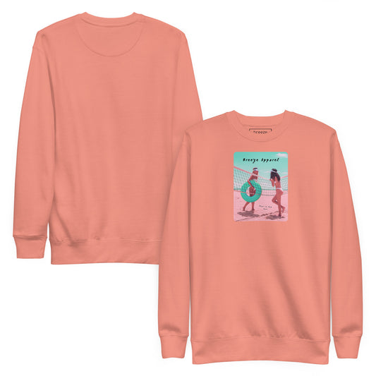 Pink sweatshirt with graphic of two women in bikinis, talking on the beach. Plain back of shirt is also shown.