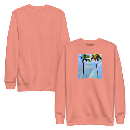 Pink sweatshirt with graphic of two palm trees with a rainbow in background. Plain back of shirt also shown.