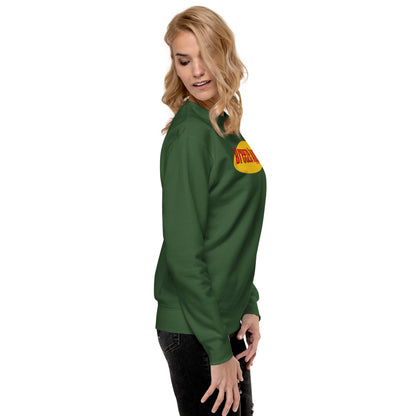 Side view of woman wearing green sweatshirt.