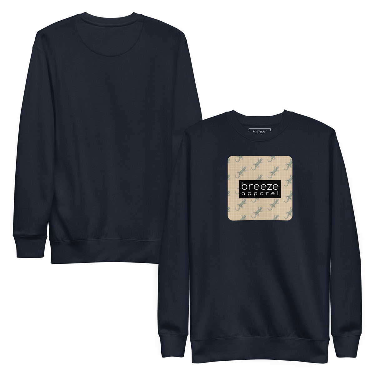 Navy sweatshirt with square over chest that contains pattern of green geckos set on beige background, overlaid with black, rectangular logo with white lettering. Plain back also shown.