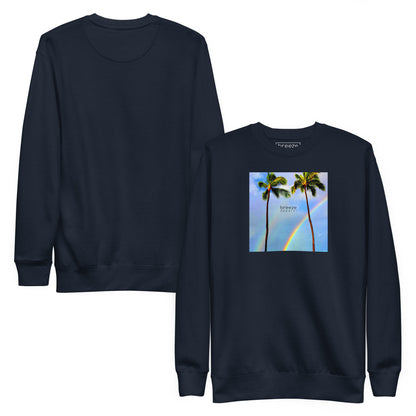 Navy sweatshirt with graphic of two palm trees with a rainbow in background. Plain back of shirt also shown.