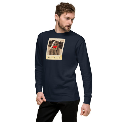 Man wearing navy sweatshirt with graphic of woman holding slice of watermelon in front of her mouth.