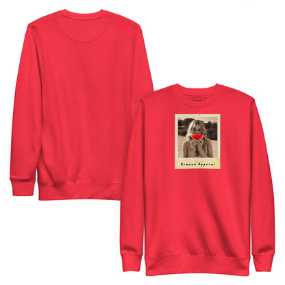 Red sweatshirt with graphic of woman holding slice of watermelon in front of her mouth. Plain back also shown.