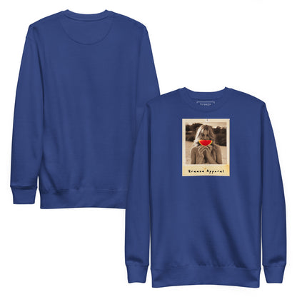 Blue sweatshirt with graphic of woman holding slice of watermelon in front of her mouth. Plain back also shown.