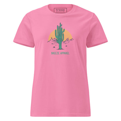 Azalea-pink t-shirt with a graphic of a cactus and sunset, with 'Breeze Apparel' written in green below.
