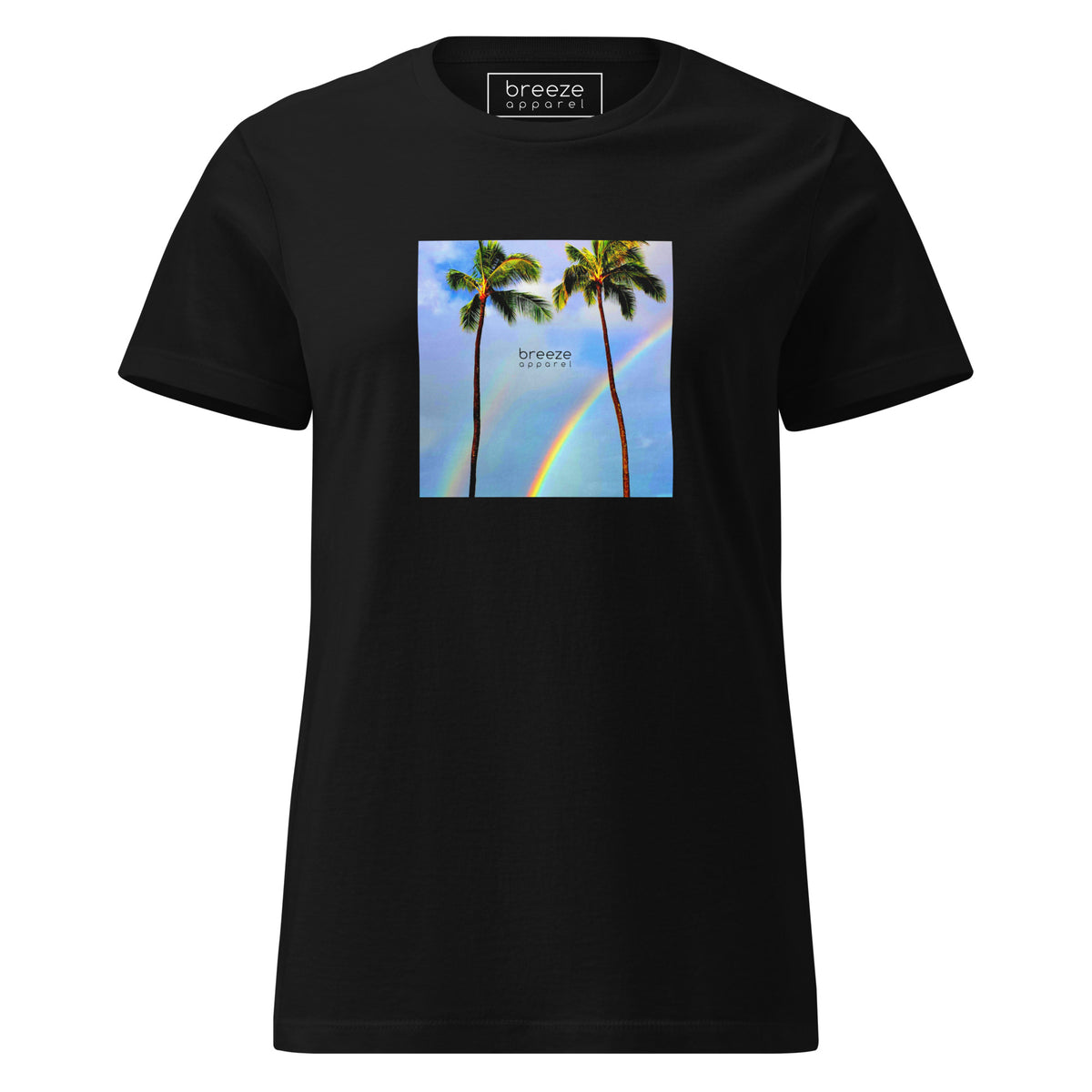 Black t-shirt with a graphic of palm trees, rainbow, and a clear blue sky in the background. A small, black 'breeze apparel' logo is between the trees. 