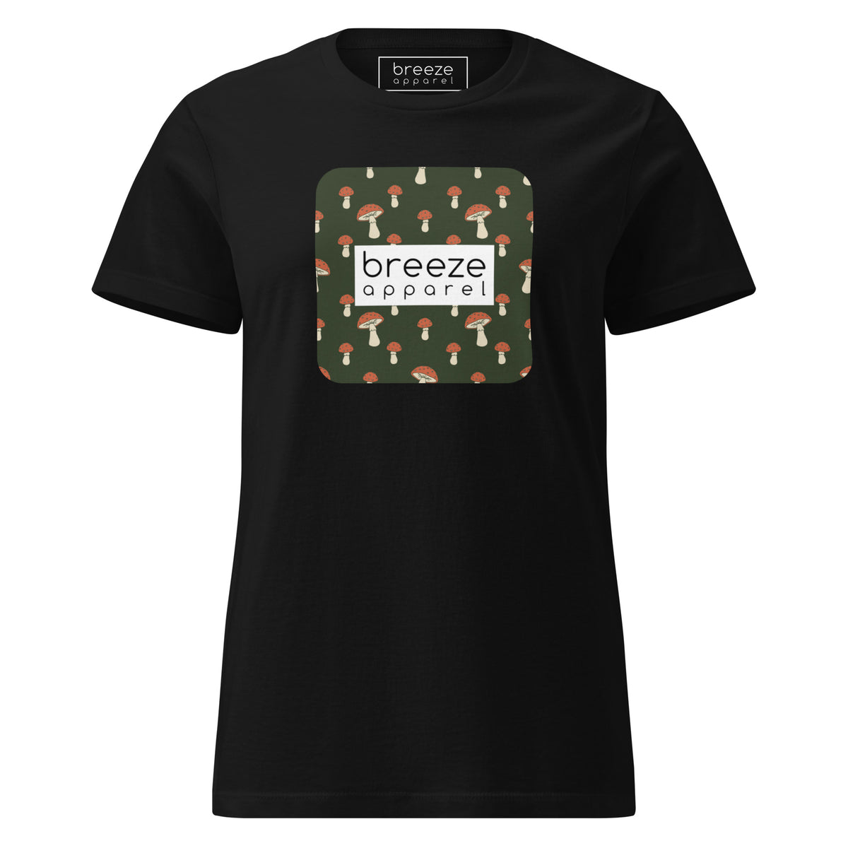 Black t-shirt with graphic of mushroom pattern set on a green background, overlaid with a white box with 'breeze apparel' in black inside.