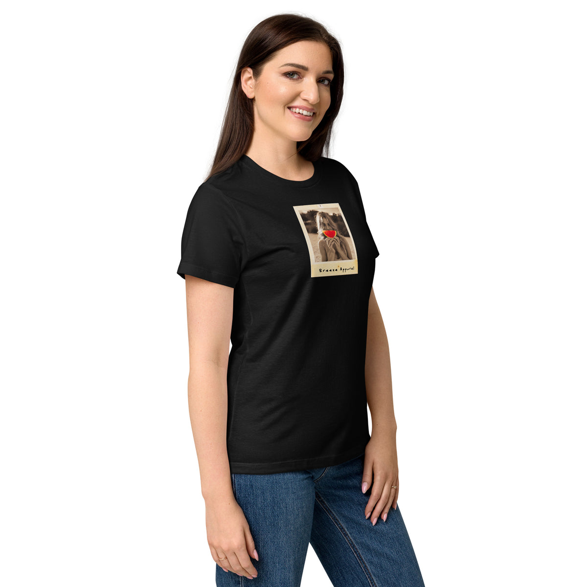 Woman wearing black t-shirt with graphic of woman holding watermelon slice in front of her mouth.