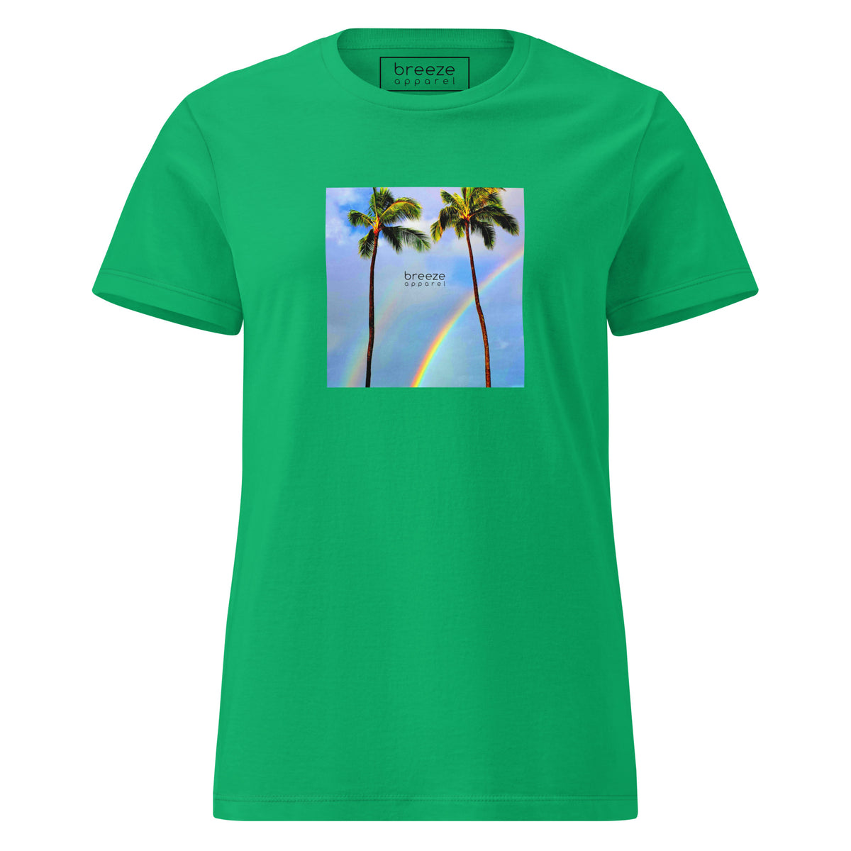 Irish-green t-shirt with a graphic of palm trees, rainbow, and a clear blue sky in the background. A small, black 'breeze apparel' logo is between the trees. 