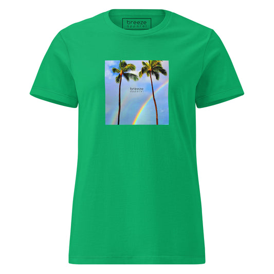 Irish-green t-shirt with a graphic of palm trees, rainbow, and a clear blue sky in the background. A small, black 'breeze apparel' logo is between the trees. 