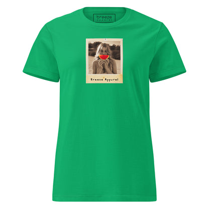 Green t-shirt with graphic of woman holding watermelon slice in front of her mouth.