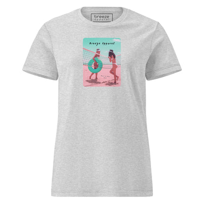 Sport-gray t-shirt with an image of two women in bikinis on the beach, standing by a volleyball net, one holding a swim ring and smiling, the other leaning on the net, with inscription in black of 'breeze apparel' towards the top of the image, and 'fun in the sun' in black on the ground between the women. 
