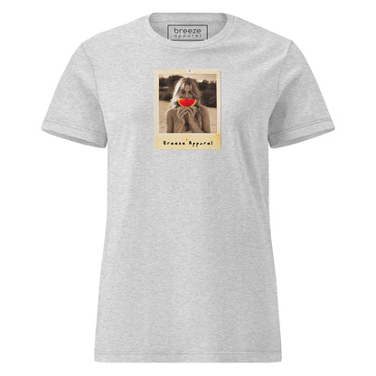 Gray t-shirt with graphic of woman holding watermelon slice in front of her mouth.