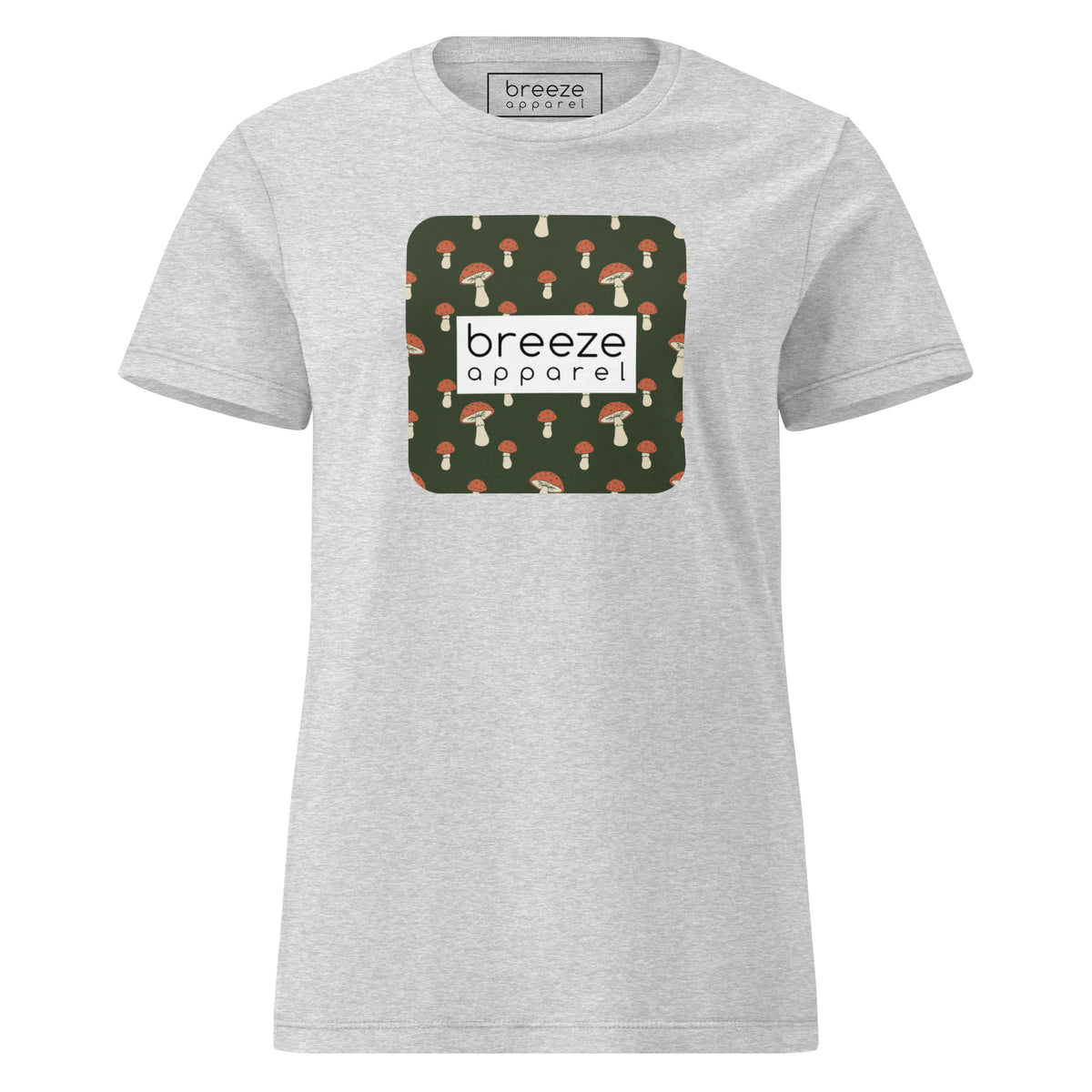 Gray t-shirt with graphic of mushroom pattern set on a green background, overlaid with a white box with 'breeze apparel' in black inside.