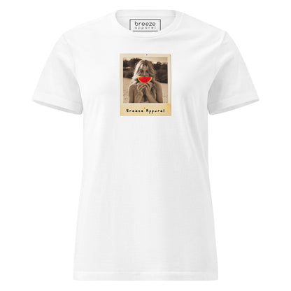 White t-shirt with graphic of woman holding watermelon slice in front of her mouth.