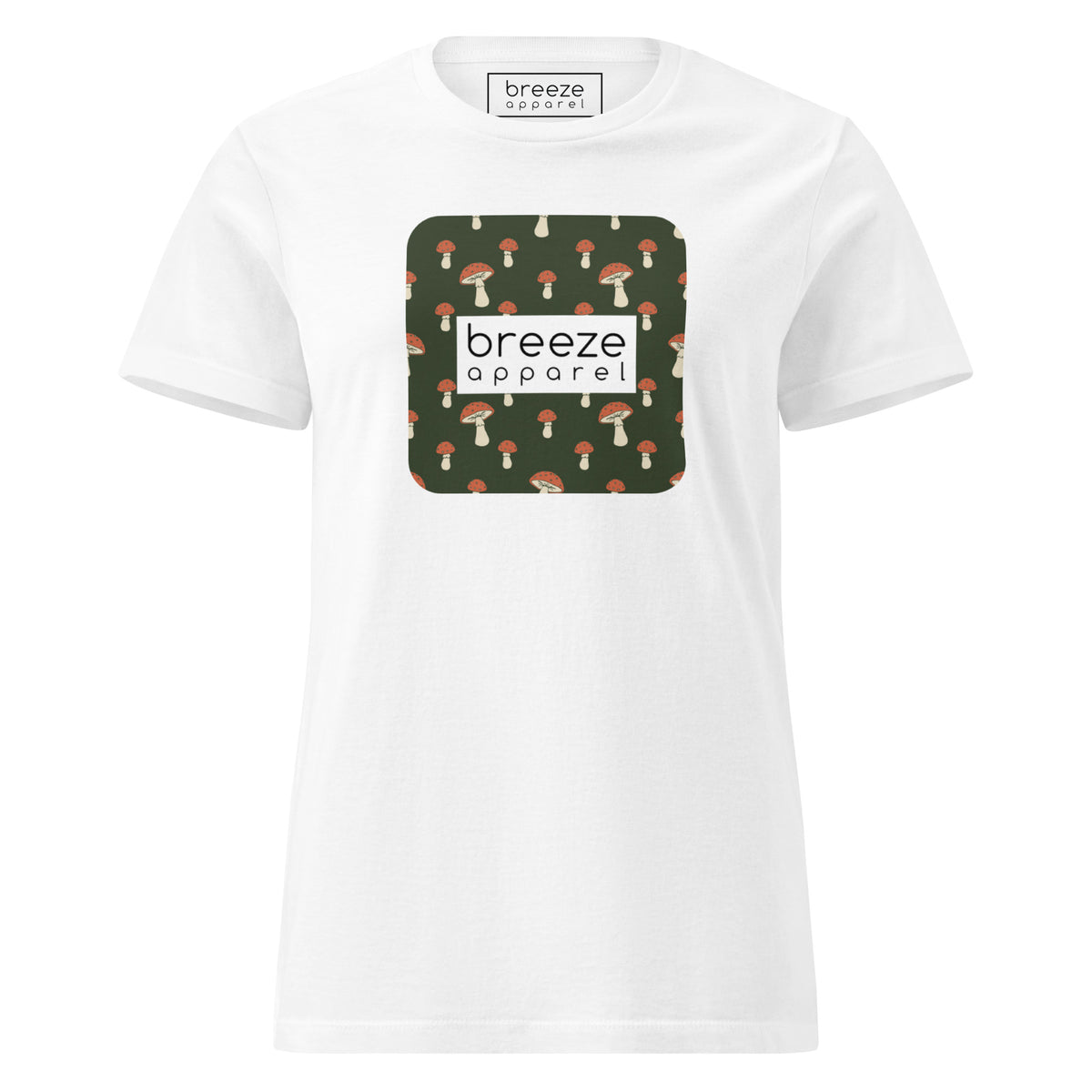 White t-shirt with graphic of mushroom pattern set on a green background, overlaid with a white box with 'breeze apparel' in black inside.