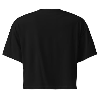 Plain back of black crop top.
