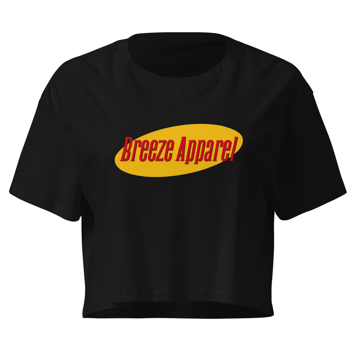 Black crop top with graphic with red lettering set on a yellow oval. 