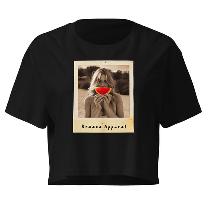 Black crop top with graphic of woman holding piece of watermelon in front of her mouth.