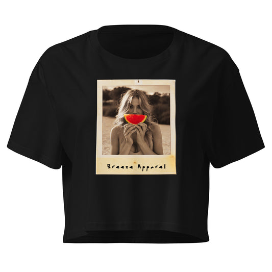Black crop top with graphic of woman holding piece of watermelon in front of her mouth.