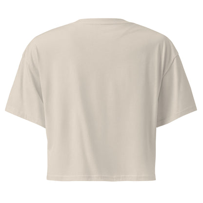 Plain back of cream crop top.