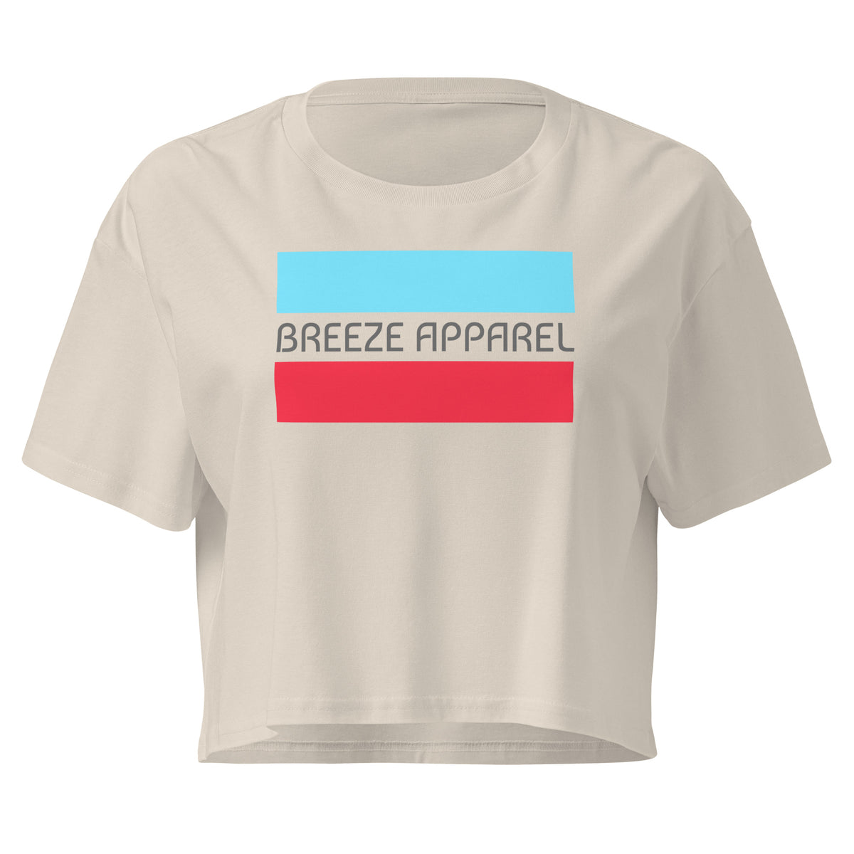 Cream crop top with graphic of gray lettering between blue and red horizontal bars.
