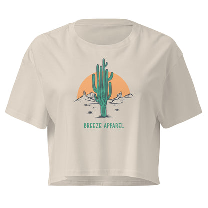 Cream crop top with cactus graphic.