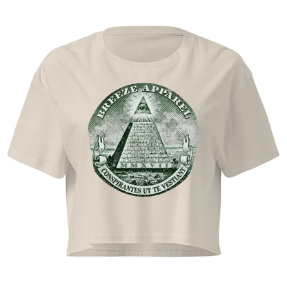 Beige crop top with graphic resembling pyramid from US one-dollar bill.