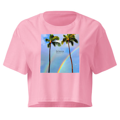 Pink crop top with graphic of palm trees and a rainbow.