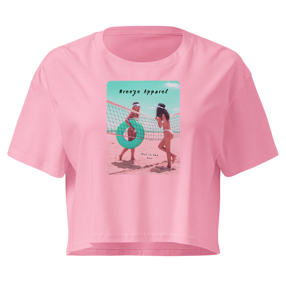 Pink crop top with graphic of two women in bikinis talking on the beach.