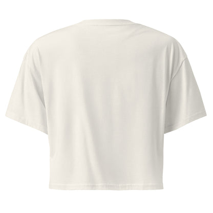 Plain back of cream crop top.