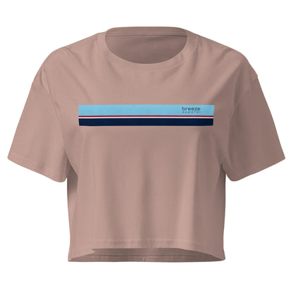 Mauve crop top with horizontal stripe that's light blue, red, white, and navy.