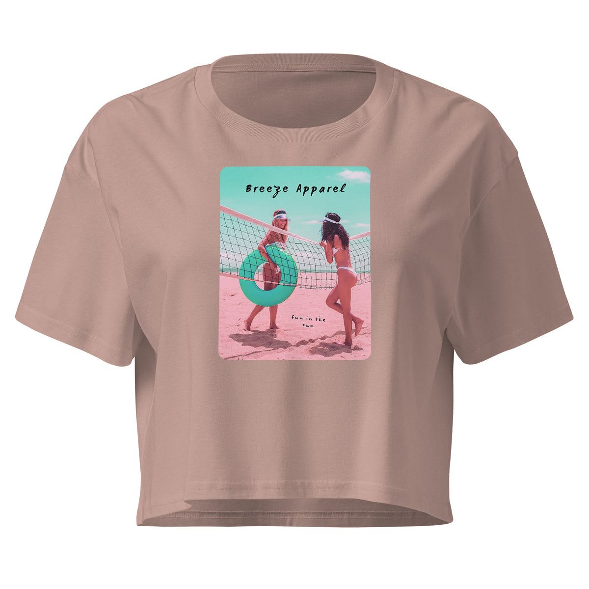 Mauve crop top with graphic of two women in bikinis talking on the beach.