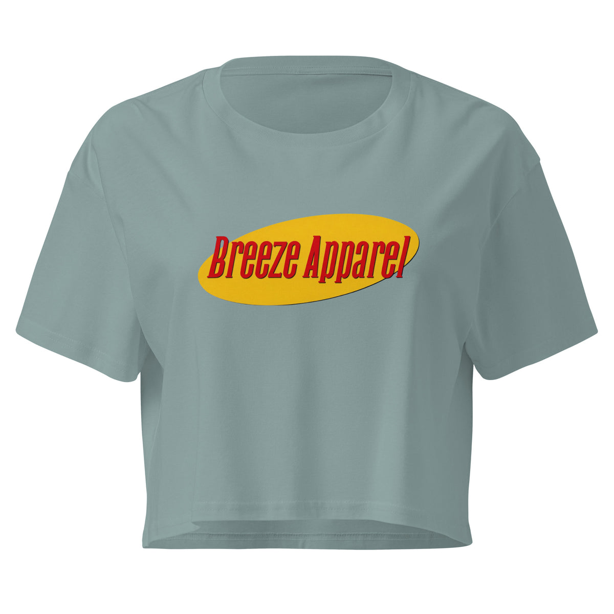 Blue crop top with graphic with red lettering set on a yellow oval. 