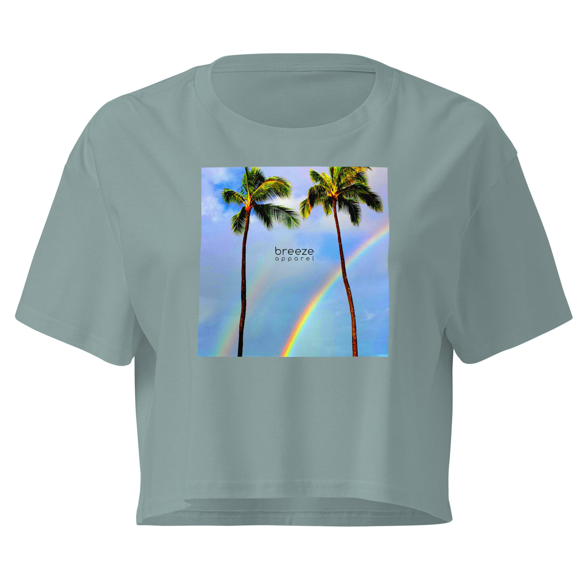 Green crop top with graphic of palm trees and a rainbow.