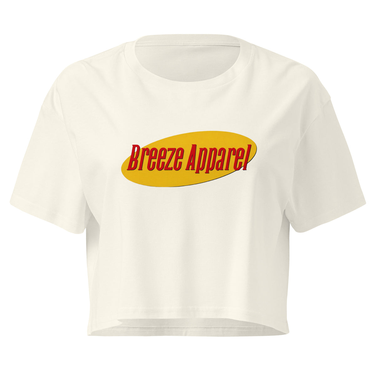 White crop top with graphic with red lettering set on a yellow oval. 