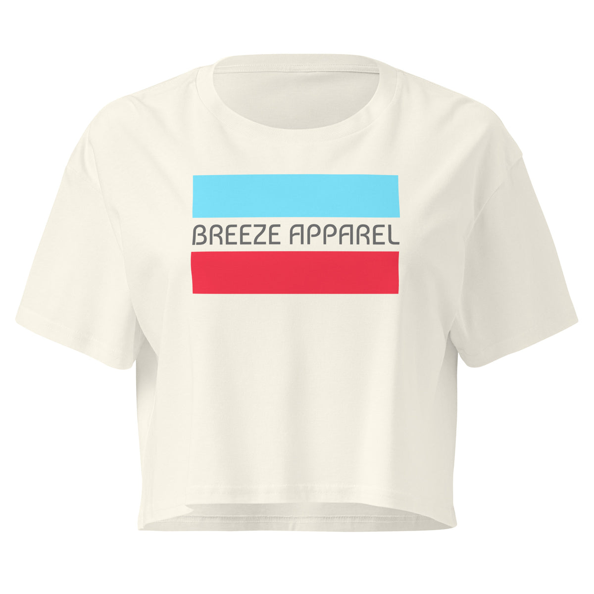 Cream crop top with graphic of gray lettering between blue and red horizontal bars.