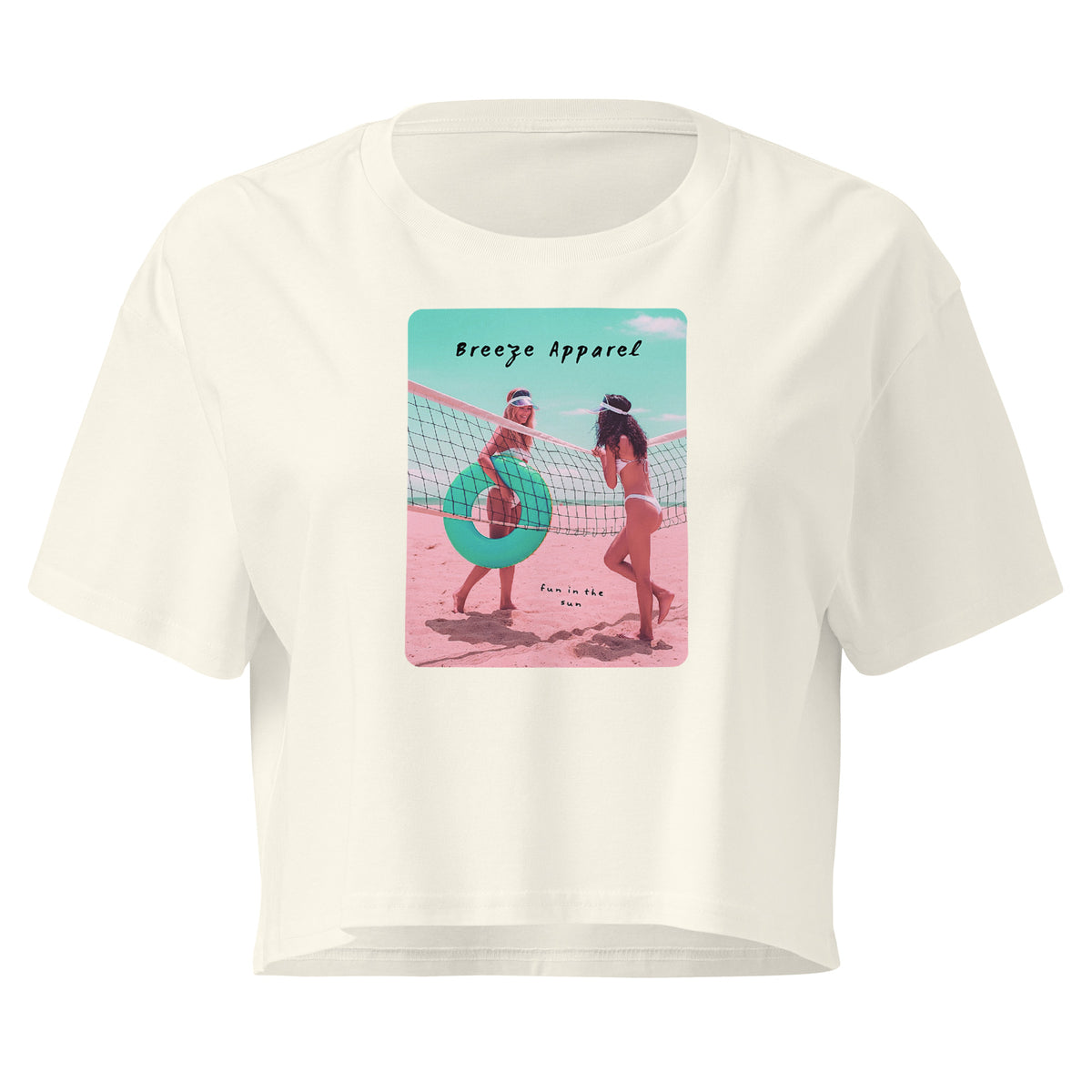Cream crop top with graphic of two women in bikinis talking on the beach.