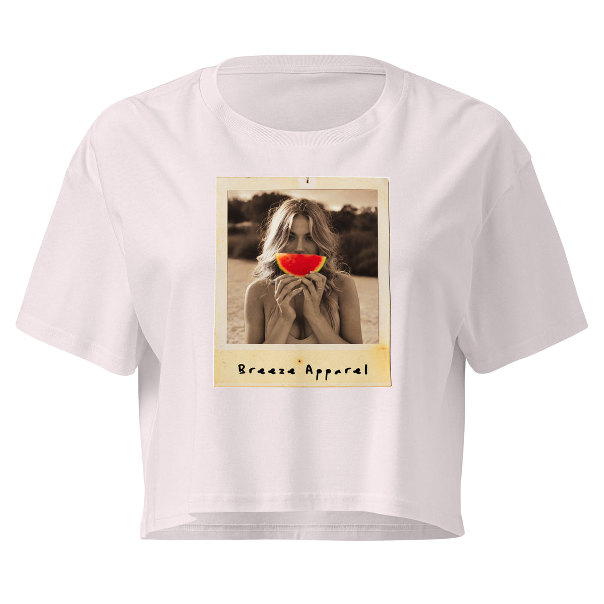 Orchid crop top with graphic of woman holding piece of watermelon in front of her mouth.