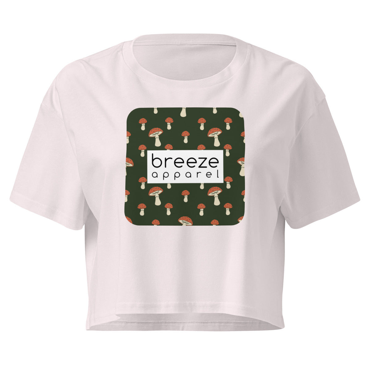 Orchid crop top with graphic of mushrooms set on a green background and overlaid with a white rectangle logo.